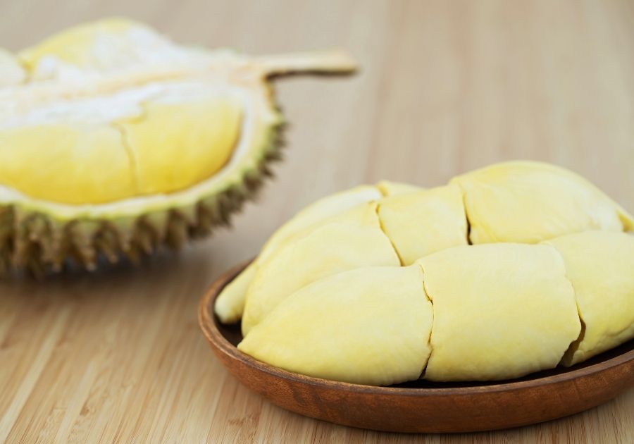 Durian Fruit Flesh Served on Wooden Plate