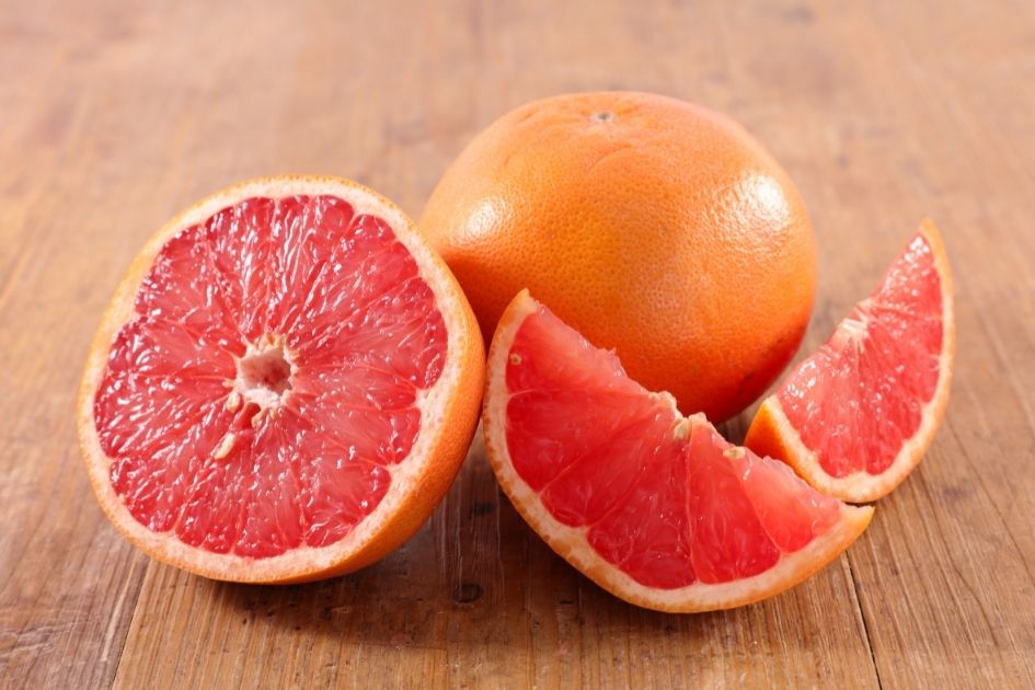 Sliced Grapefruits on a Table
