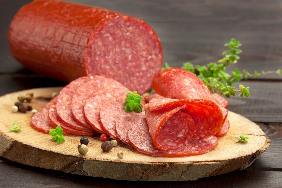 Slices of Salami placed on a cutting board