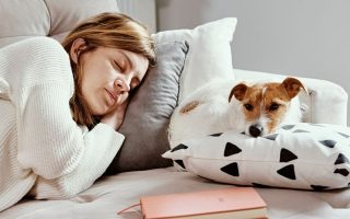 Why Do Dogs Sleep With Their Bum Facing You?