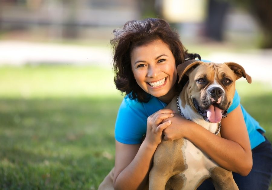 Woman with Boxer Dog